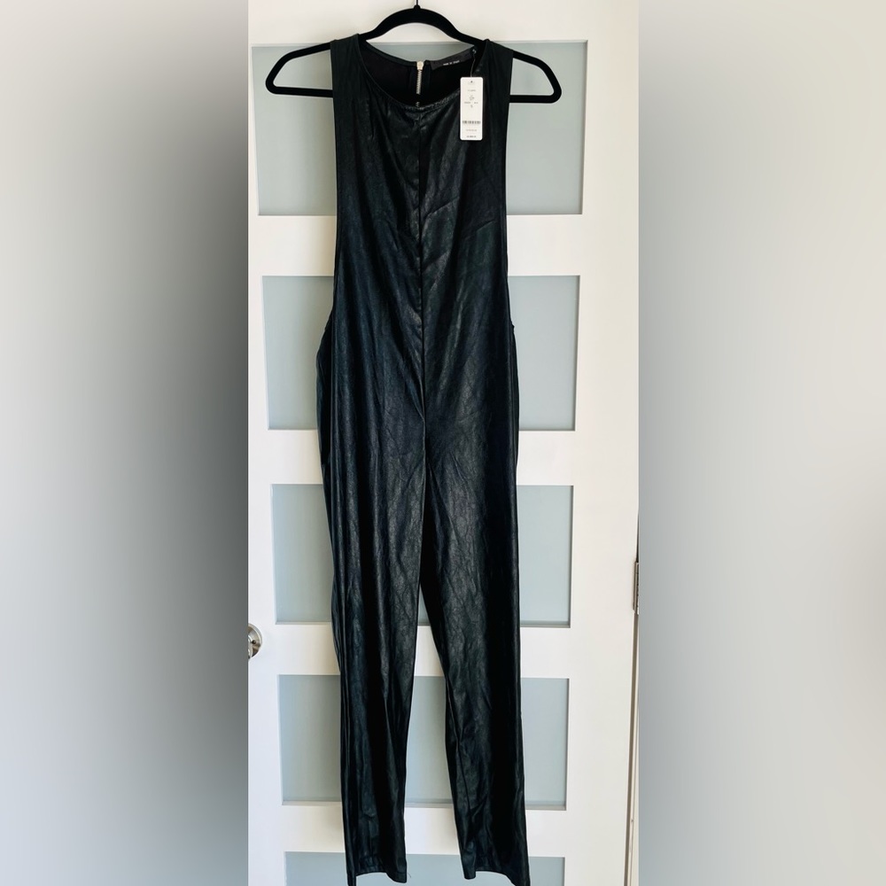 Original bebe one piece faux leather jumpsuit